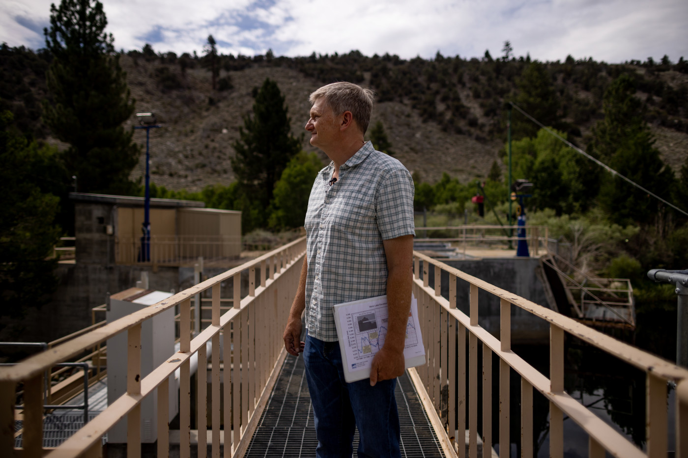 Geoffrey McQuilkin, executive director of the Mono Lake Committee, poses for a photo at the gates that are used to divert water from Lee Vining Creek to serve Los Angeles on Tuesday, Aug. 9, 2022. Spenser Heaps, Deseret News